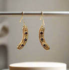 Earrings in 14k gold with Garnet