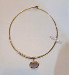 Necklace in 14k gold with a seal stone on a chalcedony