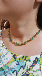 Necklace in 18k gold Perforated with Zambian emeralds