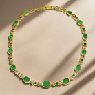 Necklace in 18k gold Perforated with Zambian emeralds