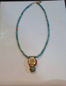 Necklace in turquoise stones and coral stones, coral stone in rose design, white 18k gold