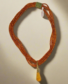 Necklace with Amber and medallion with brilliant in gold 18k