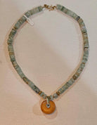 Necklace with Aquamarine gemstones, Amber medallion with diamonds and gold 18k elements