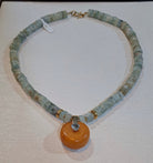 Necklace with Aquamarine gemstones, Amber medallion with diamonds and gold 18k elements