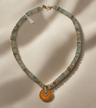 Necklace with Aquamarine gemstones, Amber medallion with diamonds and gold 18k elements