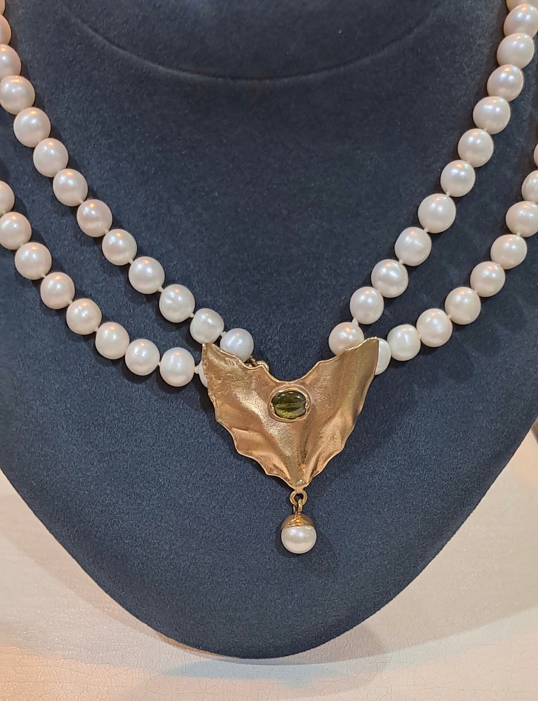 Necklace with two rows pearls and 18k gold elements