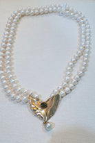 Necklace with two rows pearls and 18k gold elements