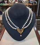 Necklace with two rows pearls and 18k gold elements