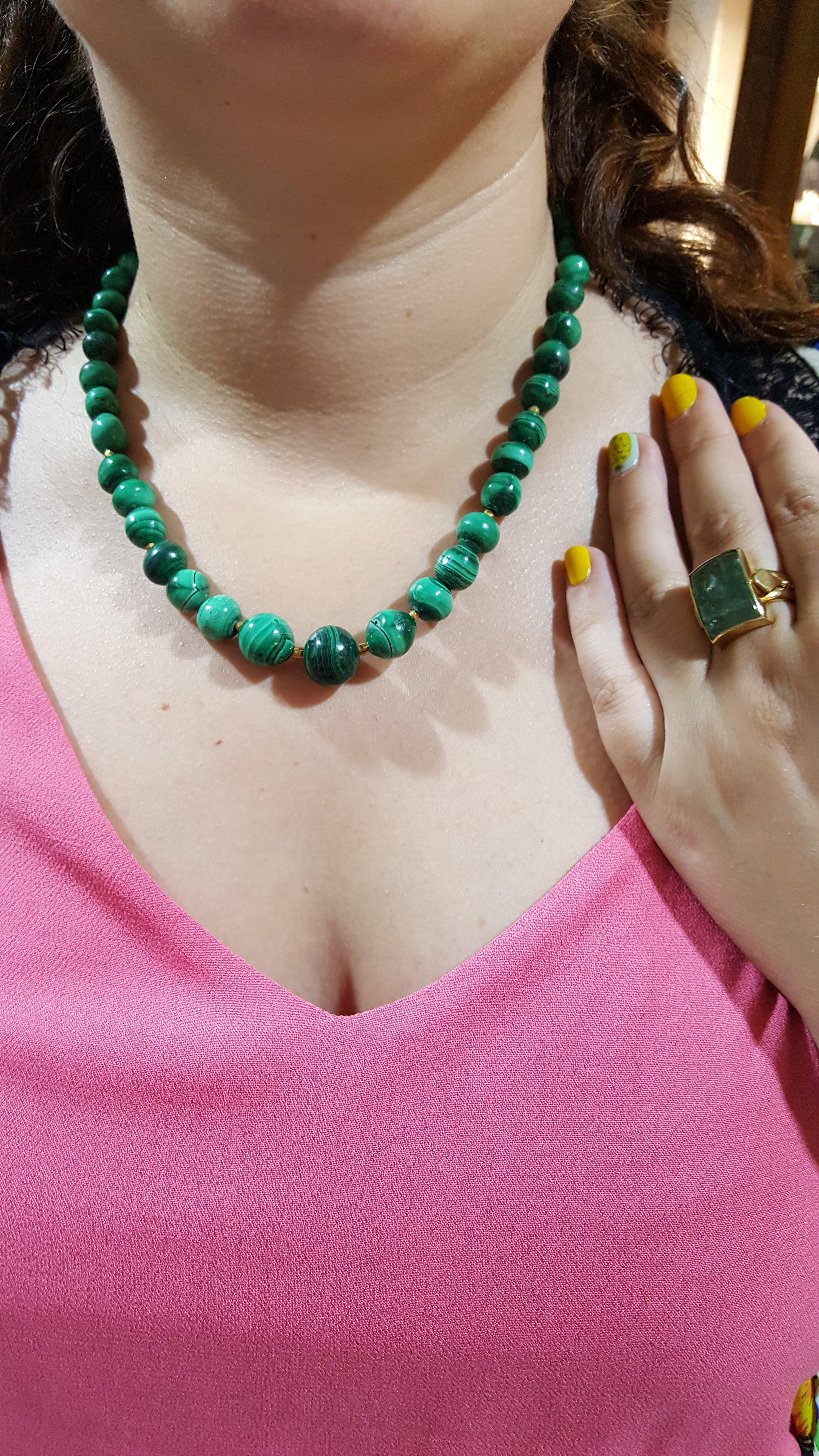 Necklaces with Malachite stones and gold 185k elements