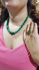 Necklaces with Malachite stones and gold 185k elements