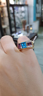 Ring in 18k Gold with Bleu Topaz 35c Tourmalines 35c and Brilliants 0.05 c. (B-72)