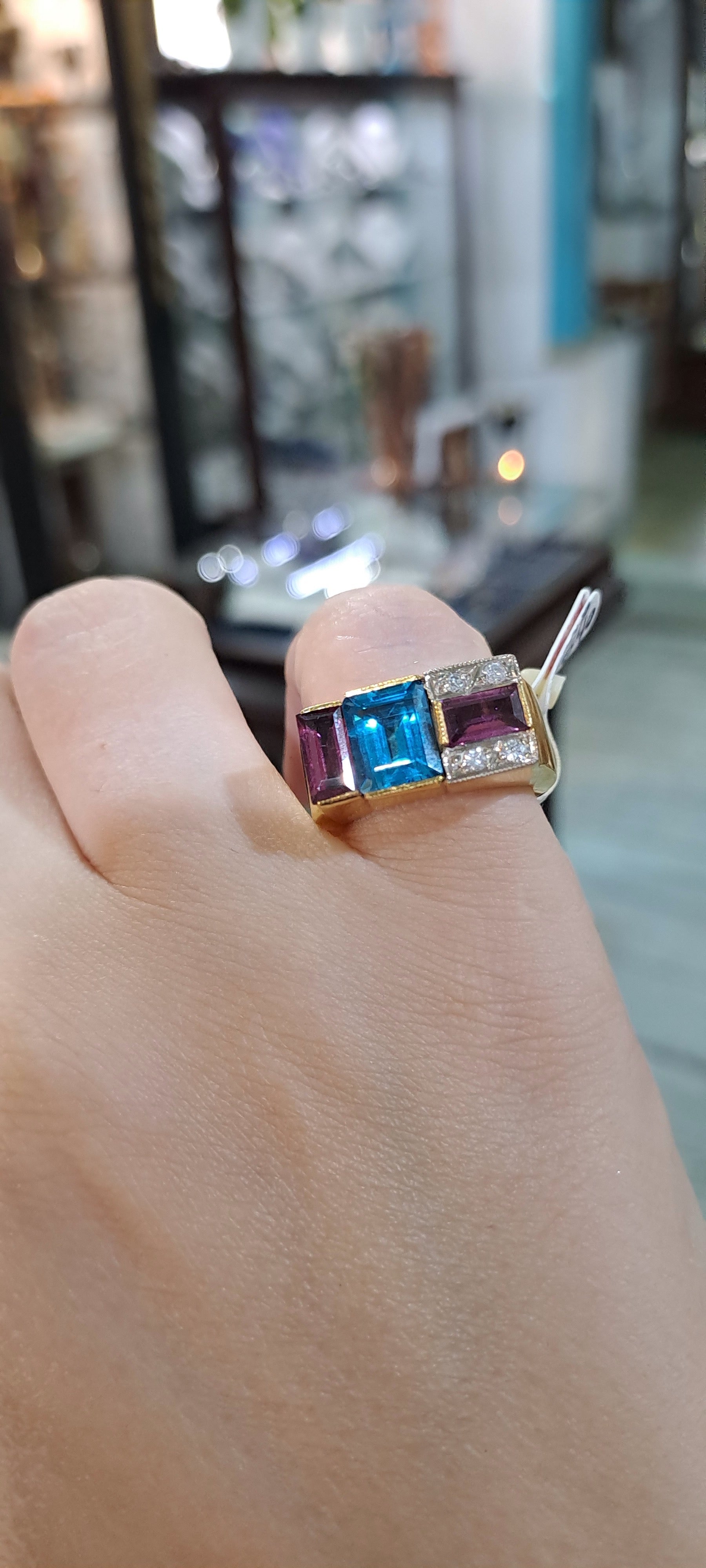 Ring in 18k Gold with Bleu Topaz 35c Tourmalines 35c and Brilliants 0.05 c. (B-72)