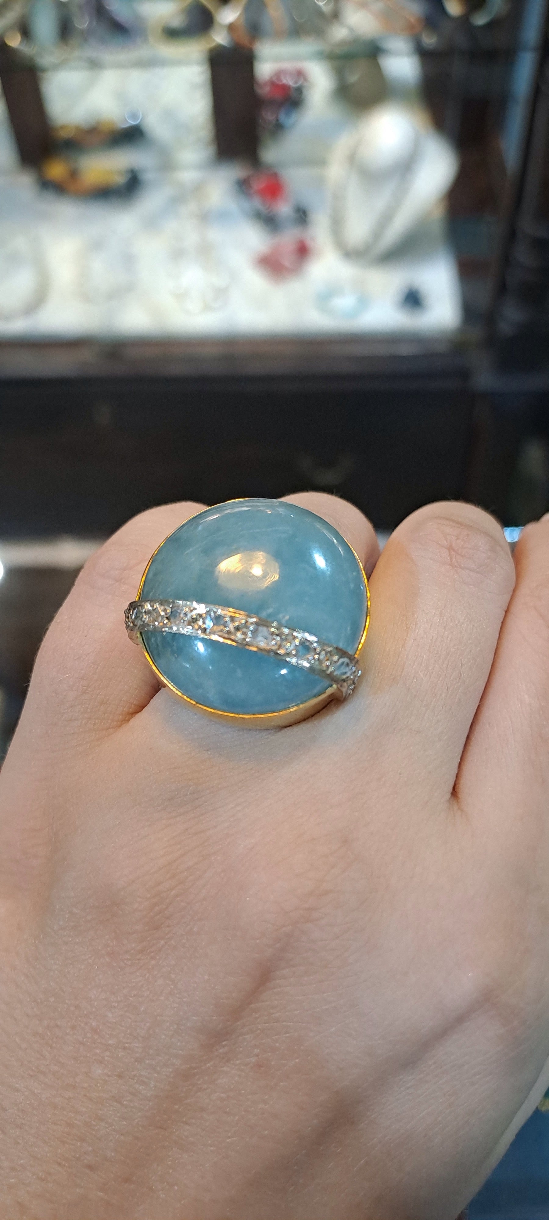 Ring in 18k Gold with a 50 ct. aqua marin cabochon and diamonds (B-16)