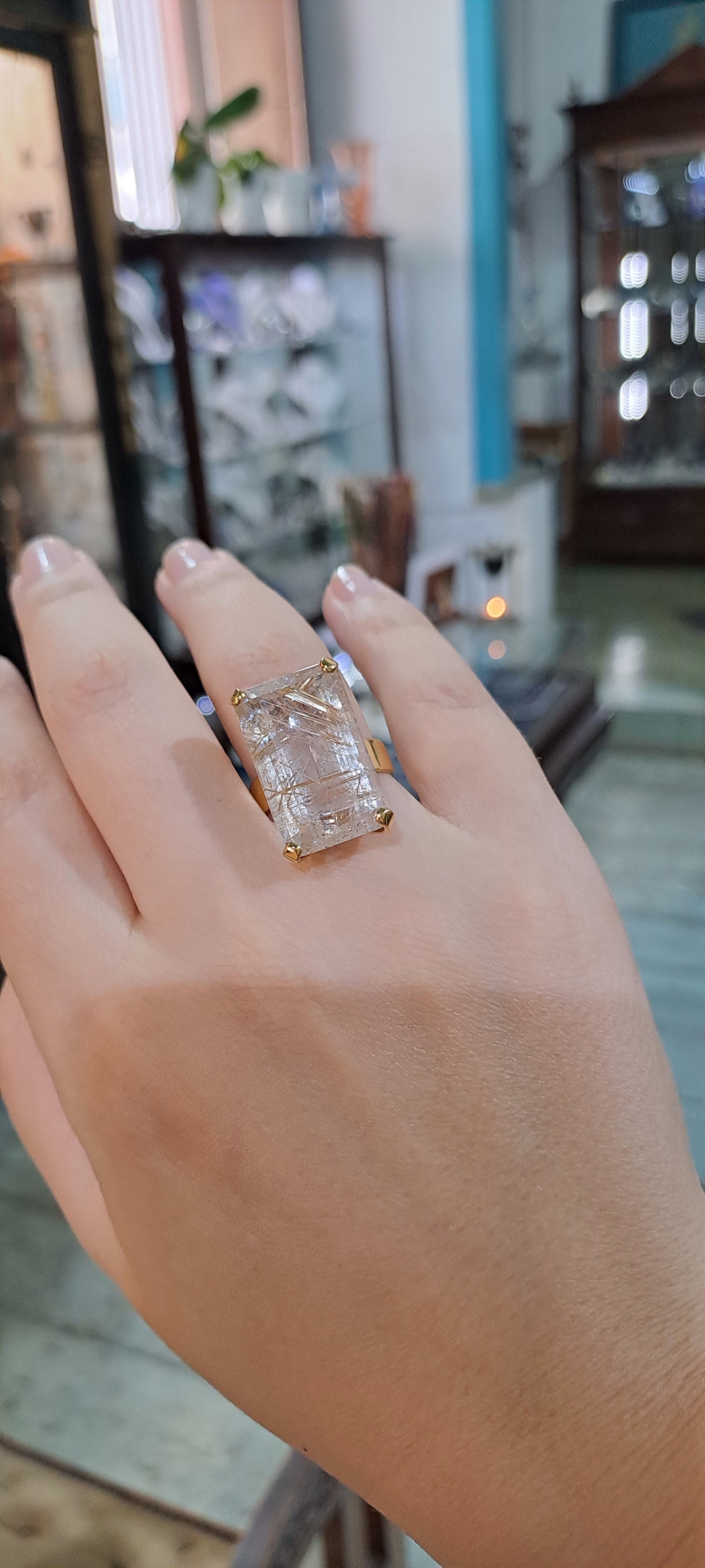 Ring in 18k Gold with a faceted rutile quartz stone (B-56)