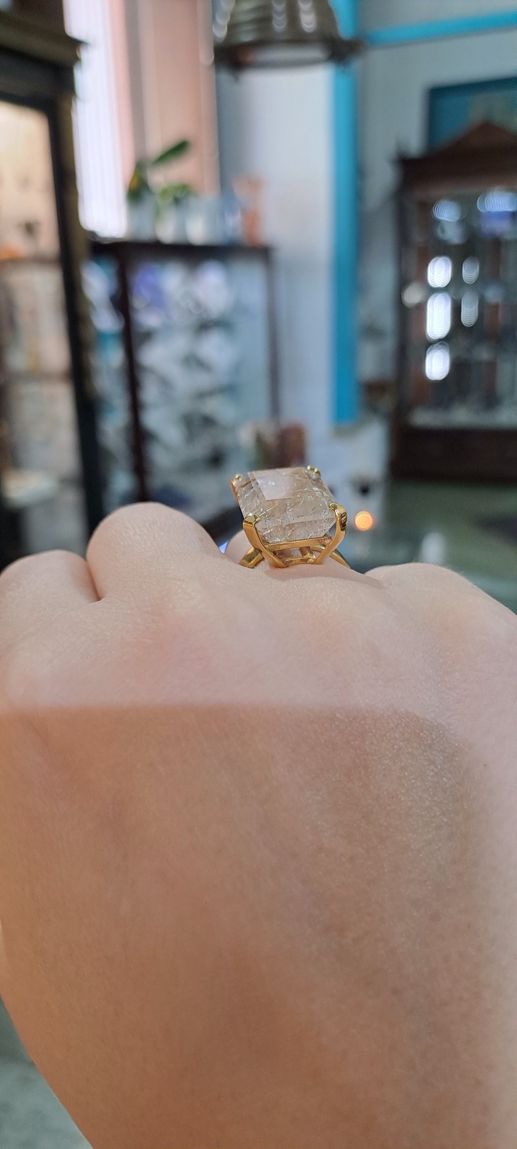 Ring in 18k Gold with a faceted rutile quartz stone (B-56)