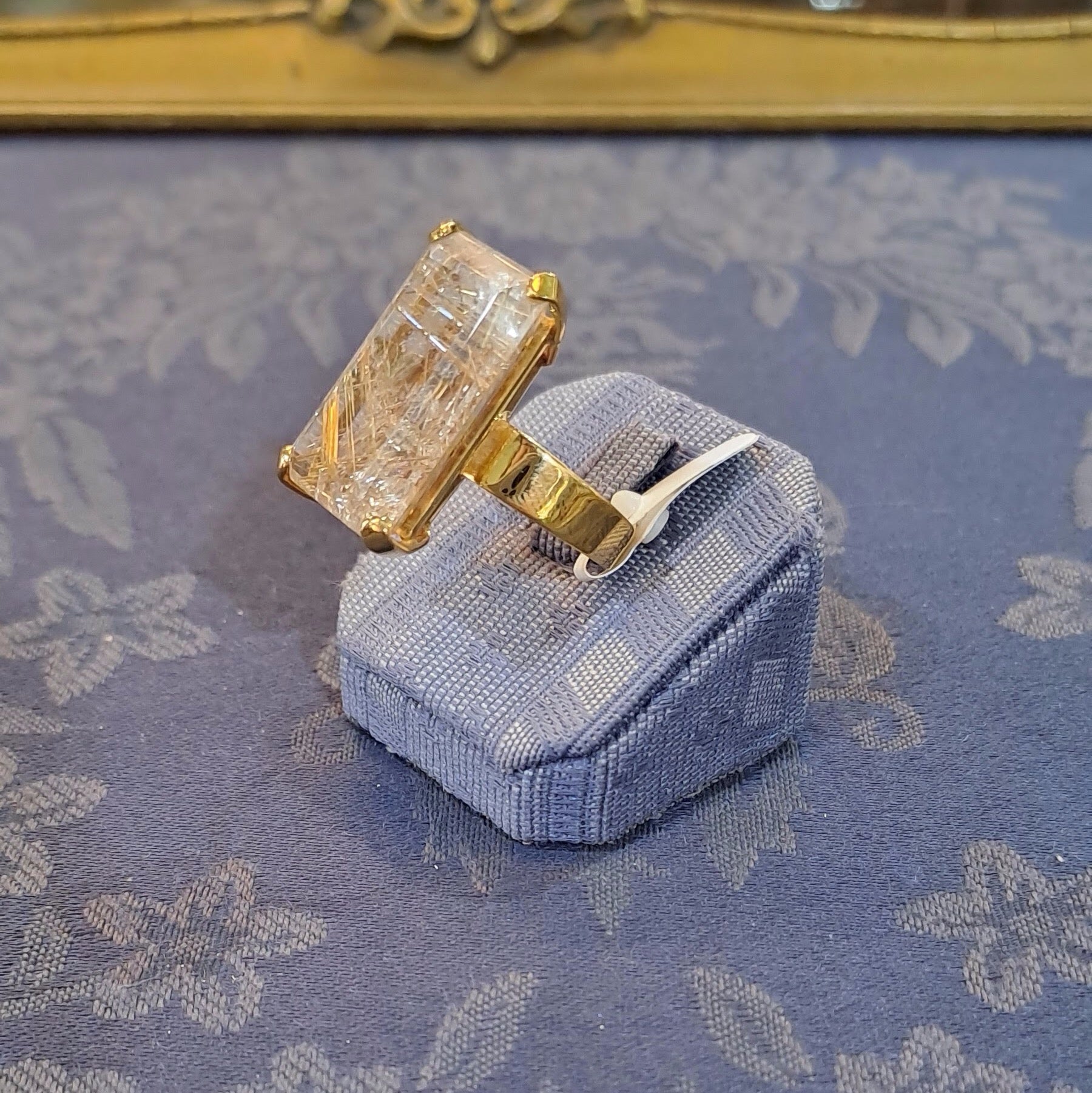 Ring in 18k Gold with a faceted rutile quartz stone (B-56)