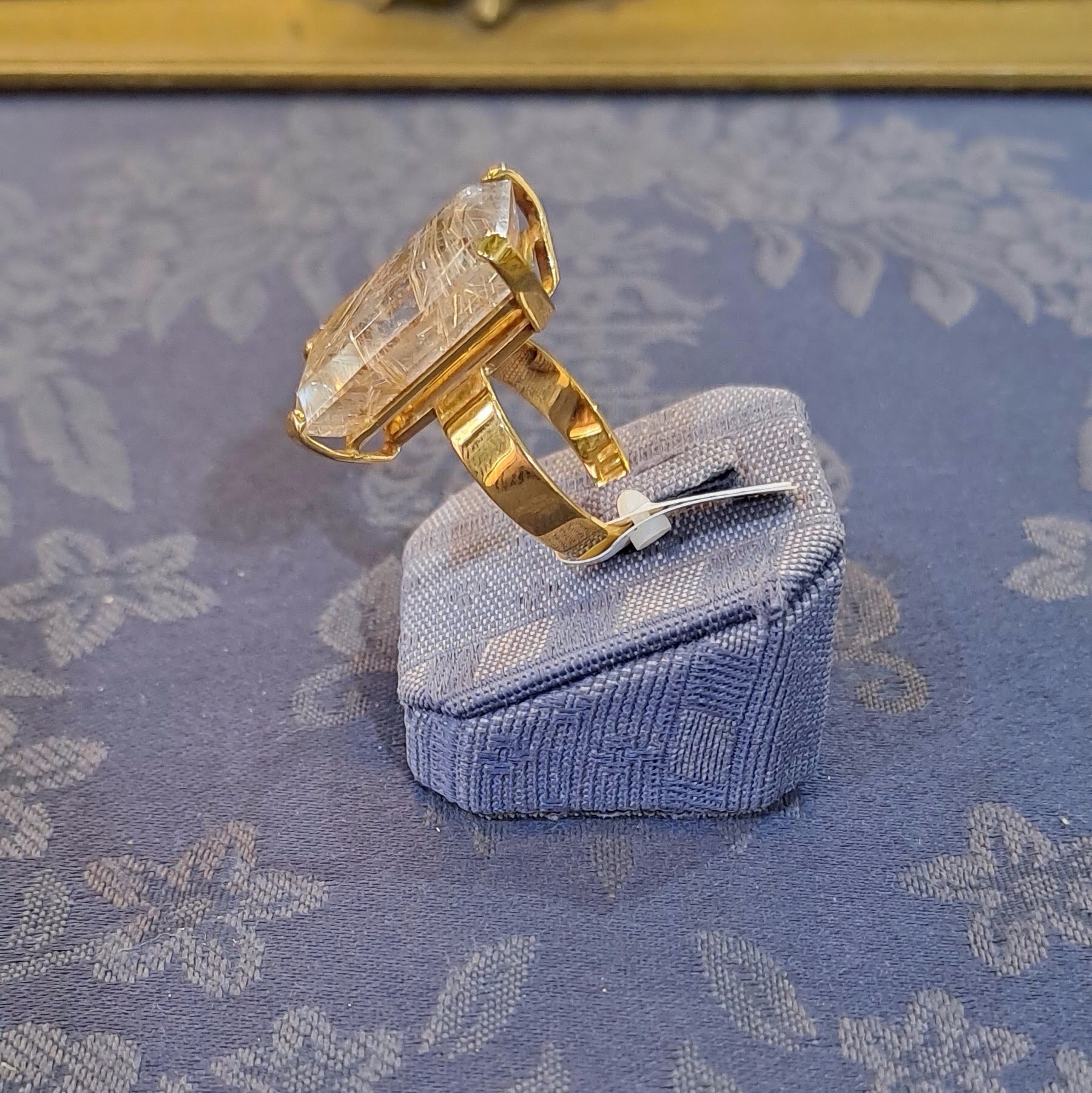 Ring in 18k Gold with a faceted rutile quartz stone (B-56)