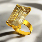 Ring in 18k Gold with a faceted rutile quartz stone (B-56)