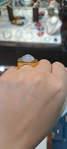 Ring in 18k gold with Chalcedony and rubies