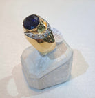 Ring in 18k gold with Iolite stone and brilliants