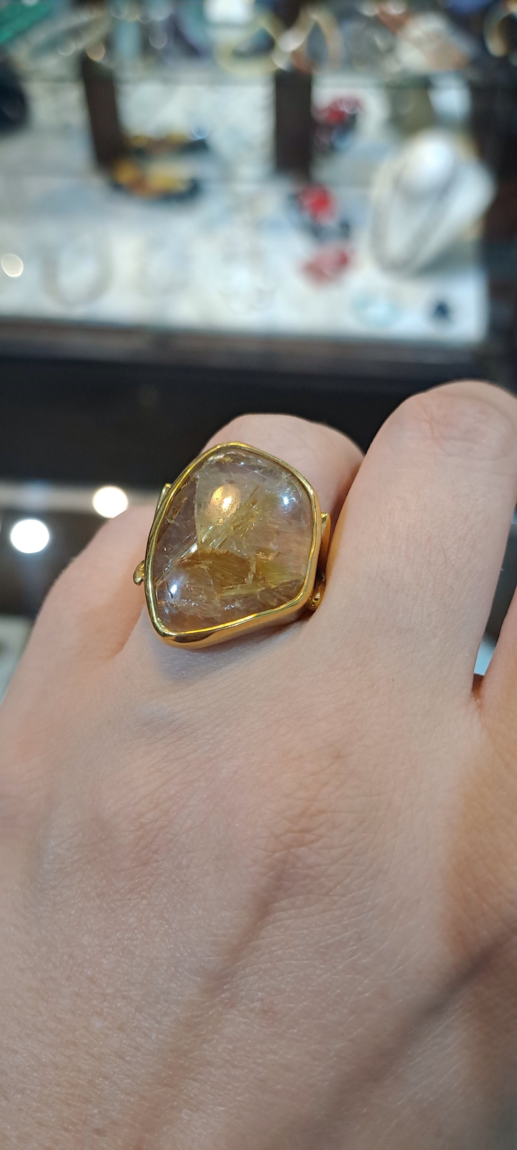 Ring in 18k gold with a Rutile Quartz stone