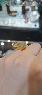 Ring in 18k gold with a Rutile Quartz stone