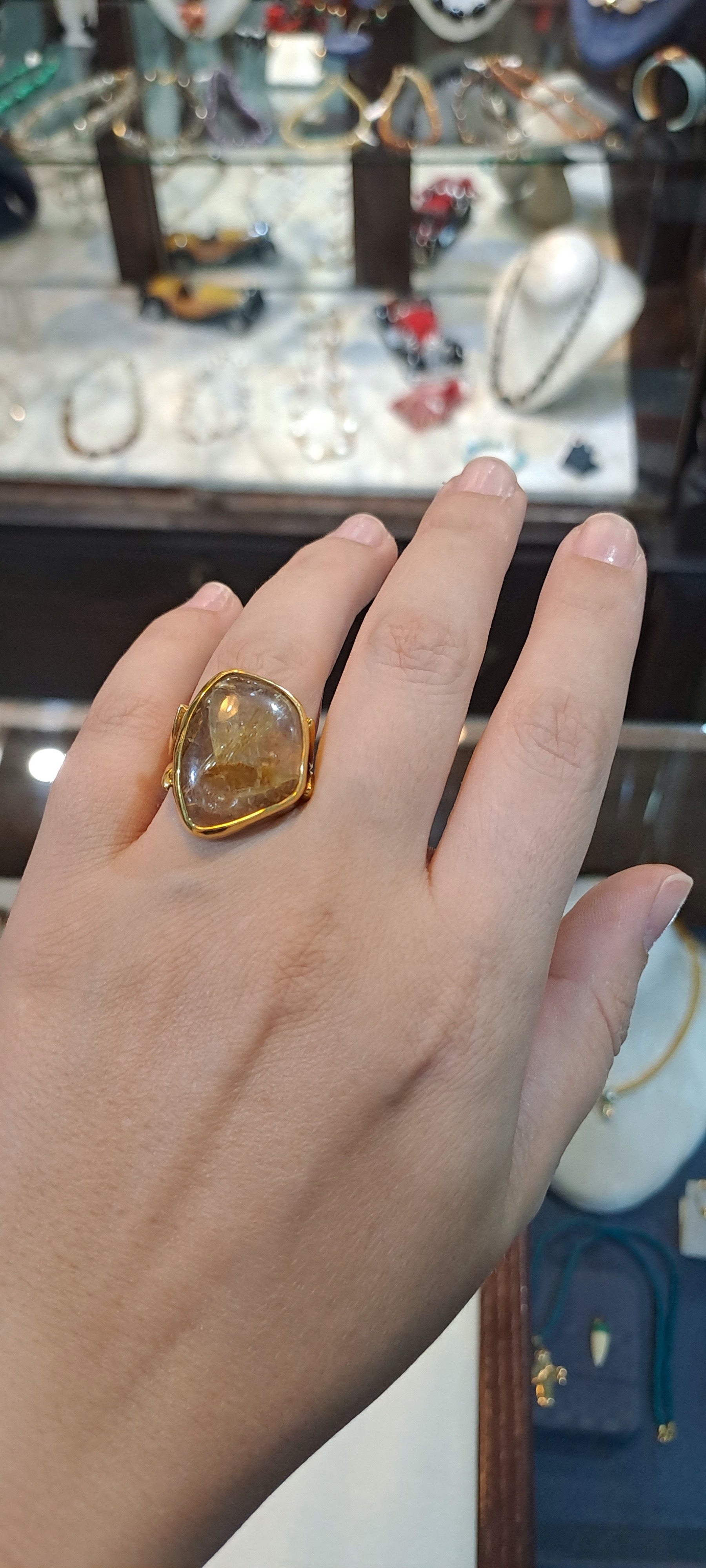 Ring in 18k gold with a Rutile Quartz stone