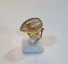 Ring in 18k gold with a Rutile Quartz stone