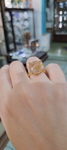 Ring in 18k gold with a rutile quartz