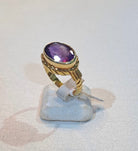 Ring in 18k gold with an amethyst stone