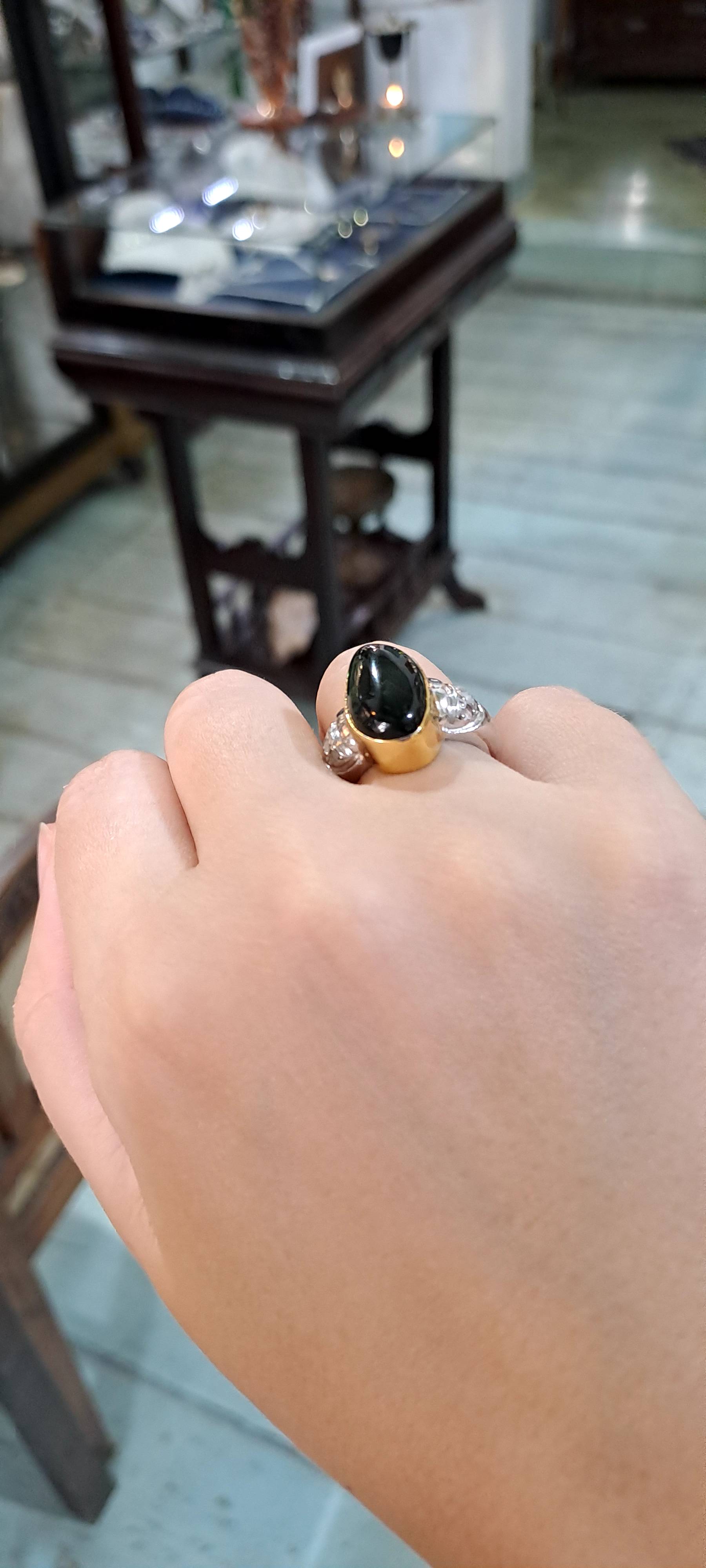 Ring in 18k gold with green tourmaline and white and yellow gold