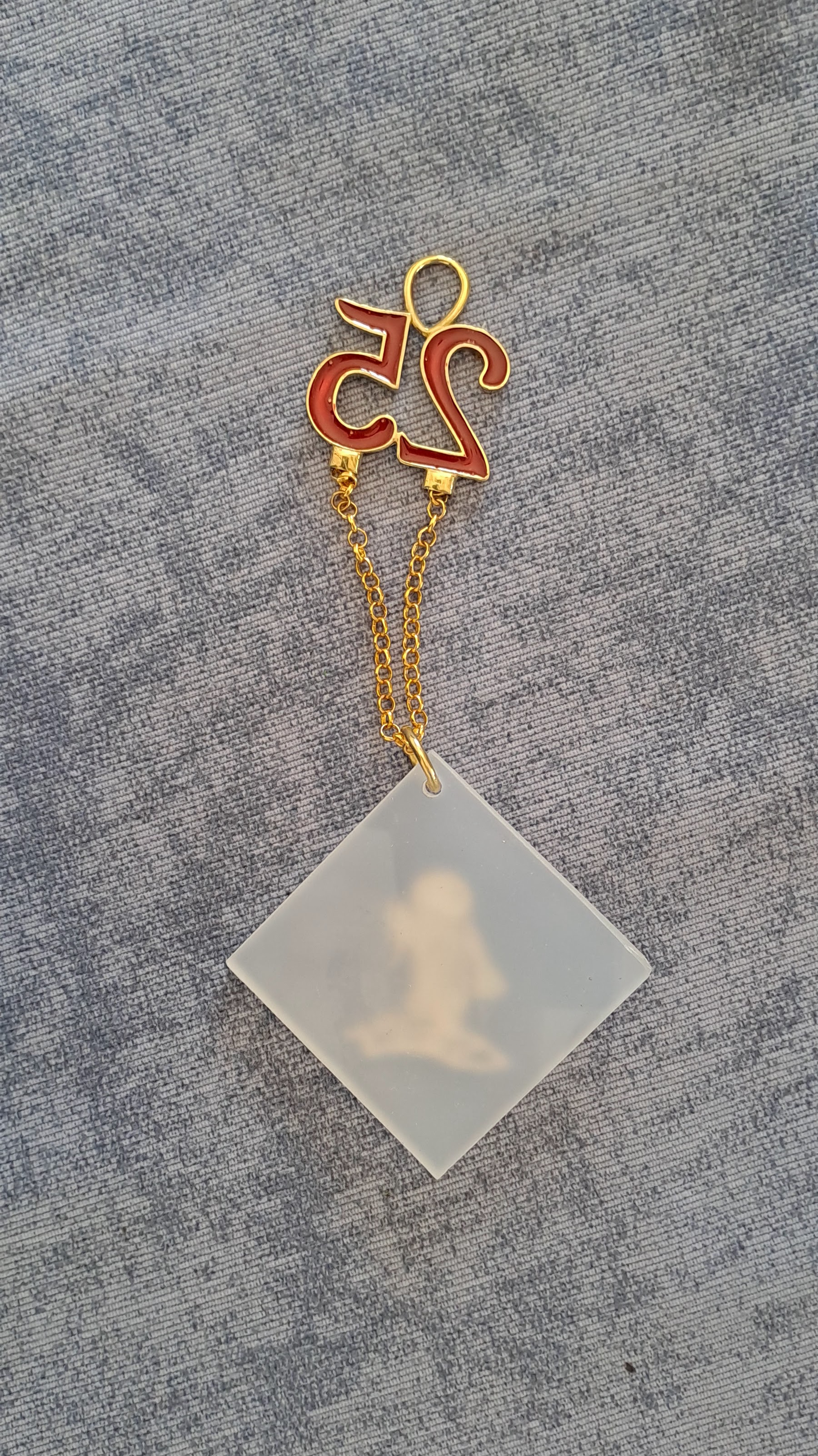 Sterling silver charm on Plexiglas - Angel Charm