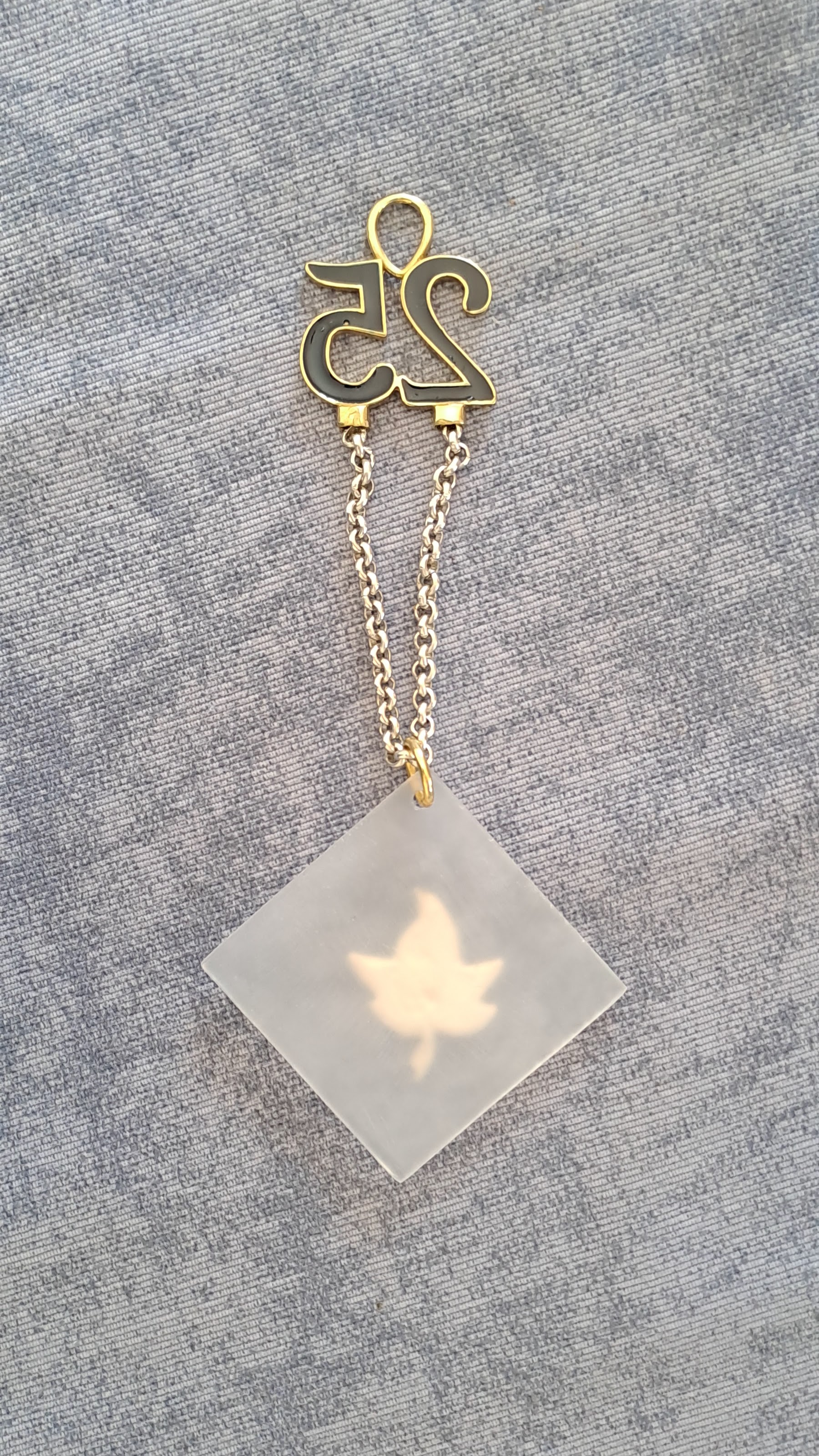 Sterling silver charm on plexiglass - Leaf clover